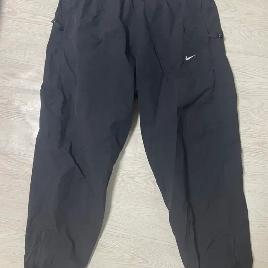 [BUNJANG] Nike NRG Solo Swoosh Woven Track Pants Black L / 나이키 NRG 솔로 스우시 우븐 트랙 팬츠 블랙 L