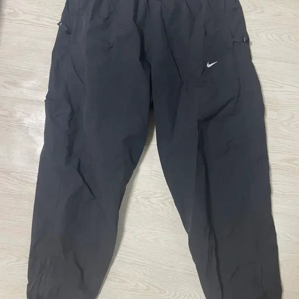 [BUNJANG] Nike NRG Solo Swoosh Woven Track Pants Black L / 나이키 NRG 솔로 스우시 우븐 트랙 팬츠 블랙 L