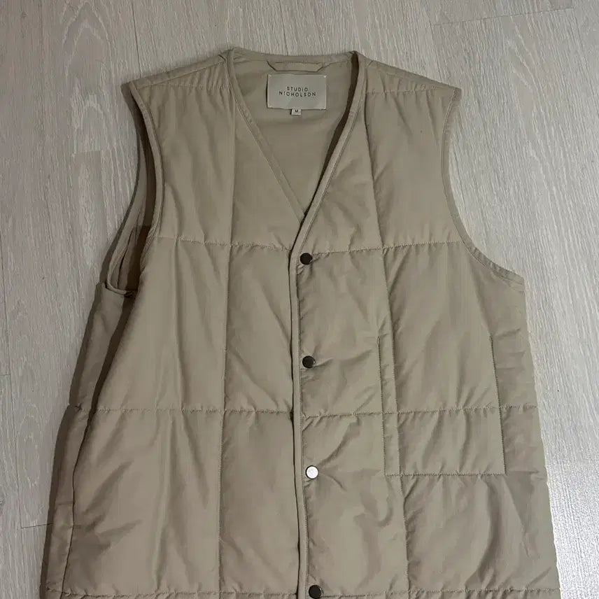 [BUNJANG] Studio Nicholson Padded Vest Beige M / M 스튜디오니콜슨 패딩 조끼