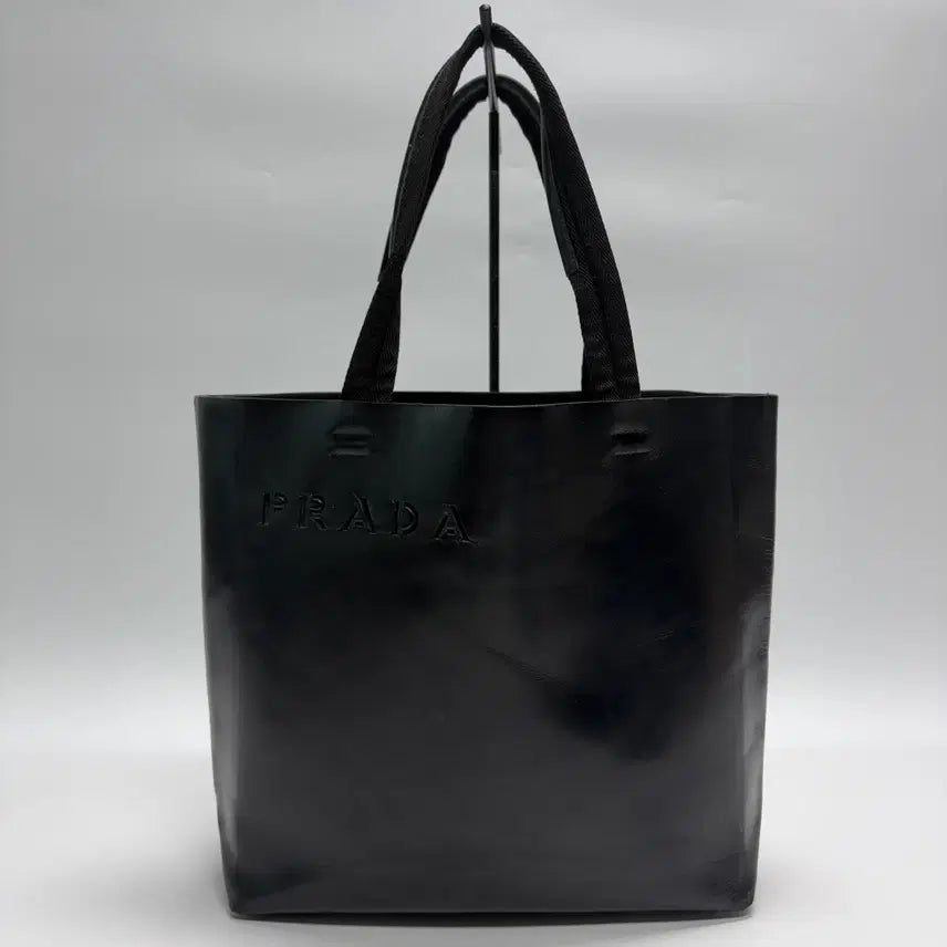 [BUNJANG] PRADA Embossed Logo Leather Tote Bag Black / 프라다 엠보싱 로고 레더 토트백 블랙 (레어템)