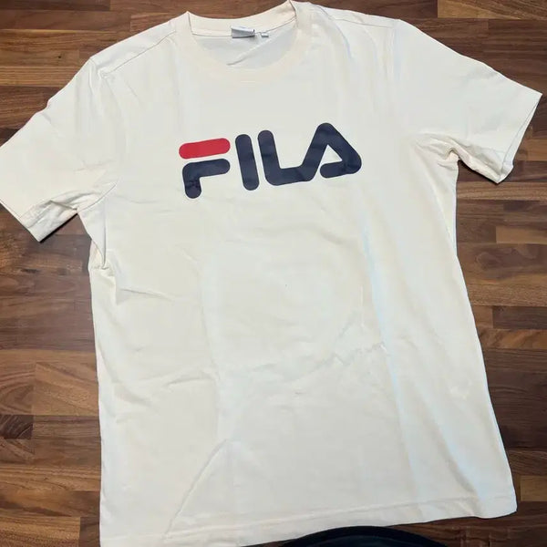 [BUNJANG] Fila Linear Regular Fit Short Sleeve T-Shirt (Ivory/L) / 휠라 리니어 레귤러핏 반팔티(아이보리/L)