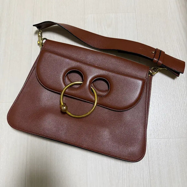 [BUNJANG] JW Anderson Gold Piercing Ring Leather Shoulder Bag (Brown) / [정품] JW 앤더슨 골드 피어싱 링 레더 숄더백 (브라운) 데일리 가방 명품