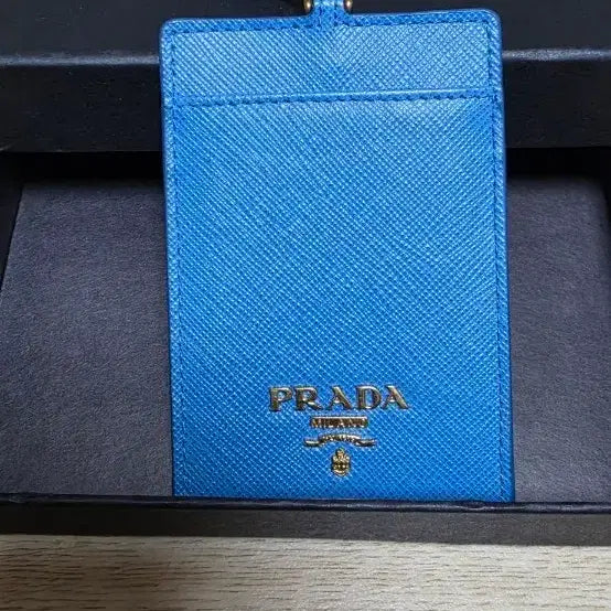 [BUNJANG] Prada Saffiano Necklace Strap Card Holder Sky Blue / 프라다 사피아노 목걸이 스트랩 카드지갑(신품급)