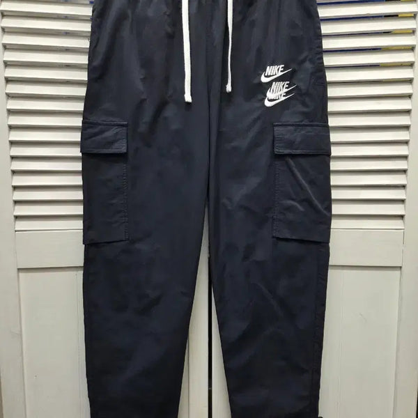 [BUNJANG] Nike NSW World Tour Woven Jogger Pants / 나이키 NSW 월드투어 우븐 조거 팬츠
