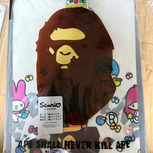 [BUNJANG] BAPE BABY MILO x Sanrio Characters T-Shirt #2 White XL / 베이프 베이비 마일로 x 산리오 캐릭터 티셔츠 #2 화이트 XL 사이즈