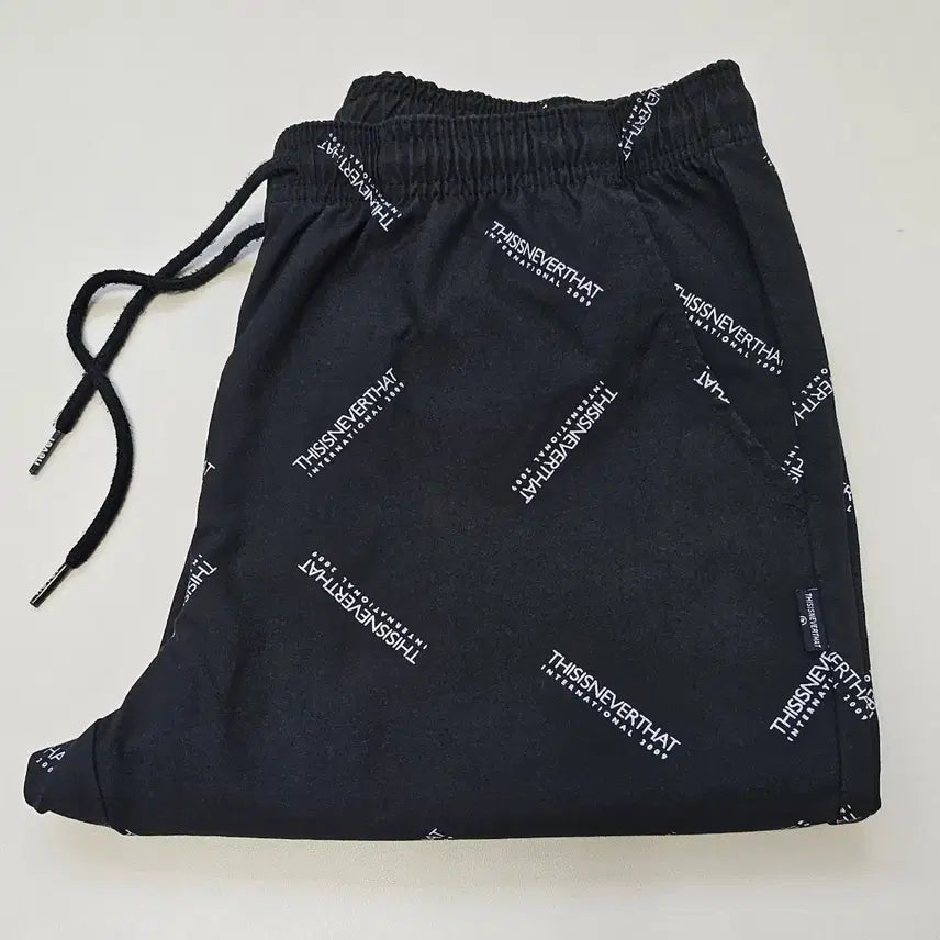 [BUNJANG] thisisneverthat Logo Pattern Pants Black / 디스이즈네버댓 로고 패턴 팬츠 블랙