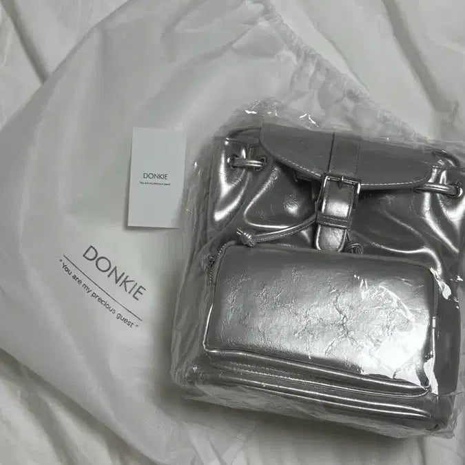 [BUNJANG] DONKIE Koi Backpack Silver (Unused) / [새상품/미사용] 돈키 DONKIE 코이 백팩 실버