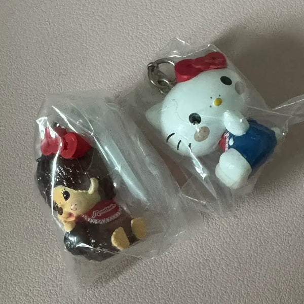 [BUNJANG] Hello Kitty x Monchhichi Collaboration Gacha Mezushi Keychain (Sealed) / 헬로키티 몬치치 콜라보 가챠 메지루시 키링 미개봉