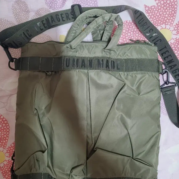 [BUNJANG] Human Made Olive Logo Print Backpack / 휴먼메이드 백팩