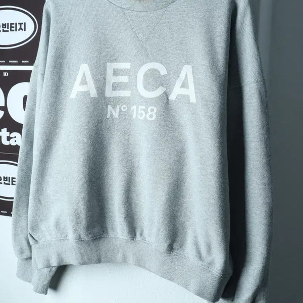 [BUNJANG] AICA WHITE Big Logo Semi-Crop Sweatshirt / W(M-XL) 에이카화이트 맨투맨 티셔츠 빅로고 세미크롭-H38796