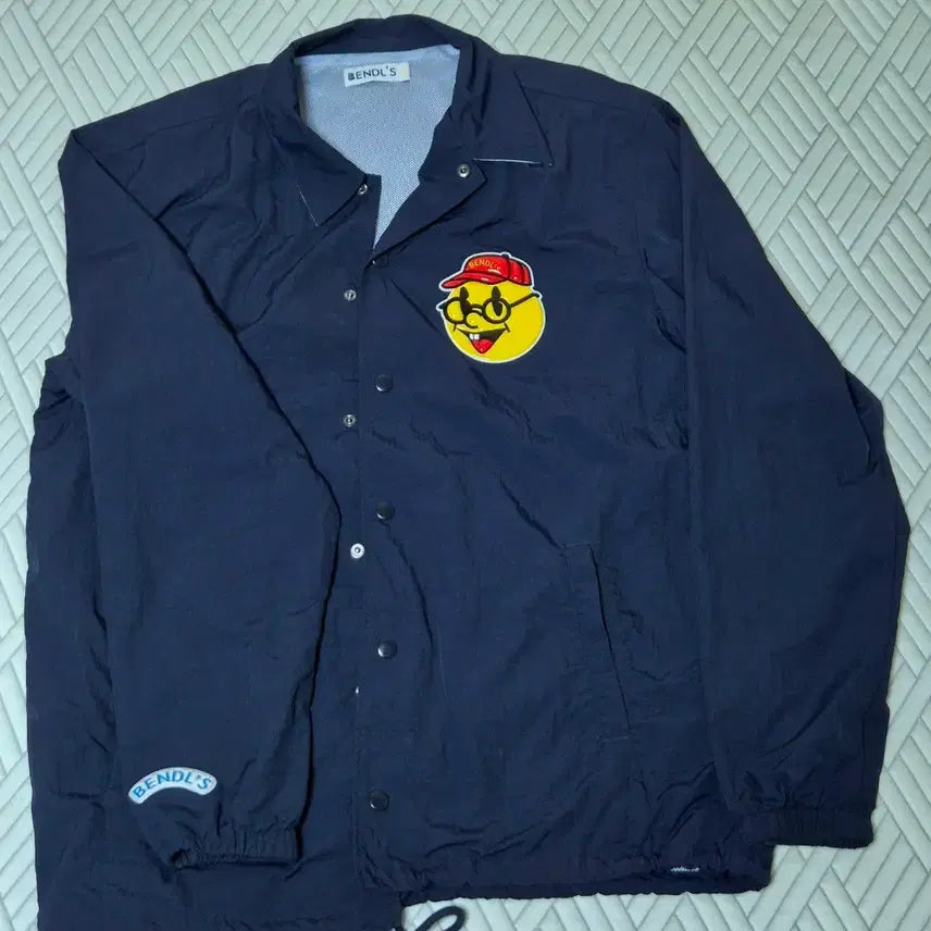 [BUNJANG] Vendles Nerd Smile Coach Jacket / 벤들스 너드 스마일 코치 자켓