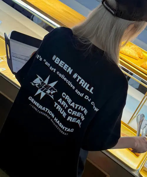 [BEENTRILL] Signature Slogan Graphic Back Print Oversized Short Sleeve T-Shirt (Black) / 시그니처 슬로건 그래픽 백 프린트 오버핏 반팔티(블랙)