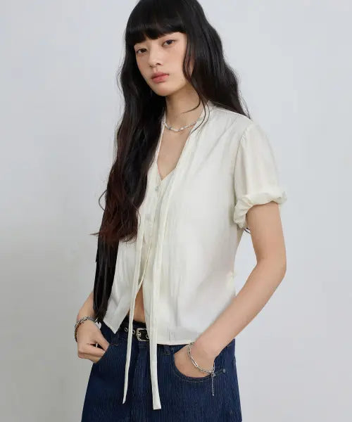 [EUGGEN] SOFT TIE BUTTON BLOUSE_CREAM / 소프트 타이 버튼 블라우스_크림