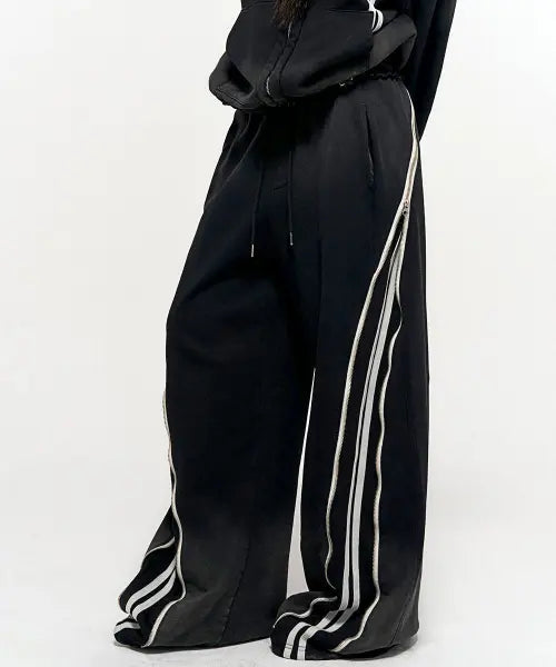 [SCHISM INDUCING] HIDDEN LINE ZIPPER SWEATPANTS BLACK