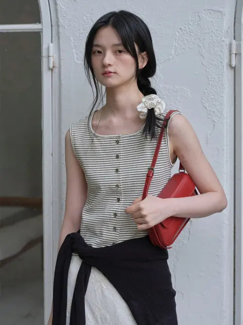 [MOAT] BUTTON RIBBED SLEEVELESS (ivory stripe) / 버튼 골지 슬리브리스 (아이보리 스트라이프)