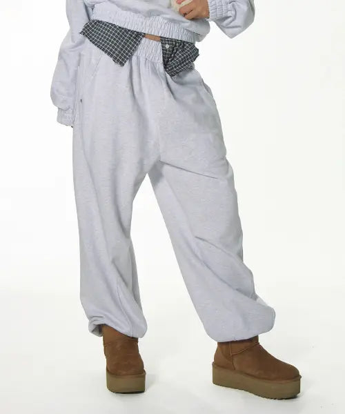 [CRANK] CURVED RIVET JOGGER PANTS_LIGHT MELANGE GREY / 커브드 리벳 조거 팬츠_라이트 멜란지 그레이