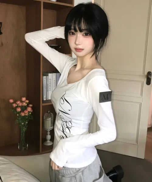 [MUCENT] ETHER ANGEL WINGS SEE-THROUGH LONG SLEEVE T (2COLOR) / 에테르 엔젤 윙스 시스루 롱 슬리브 티 (2컬러)